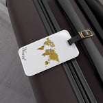 Travel the world gold tag