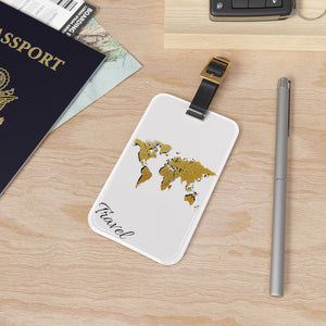 Travel the world gold tag